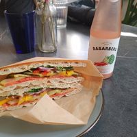 Sandwich and sparkling water at Mazā Terapija in Riga