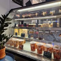 Selection of cake and other goods. at Mazā Terapija in Riga