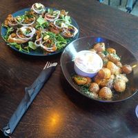 Carrot lox breads and potatoes at Mazā Terapija in Riga