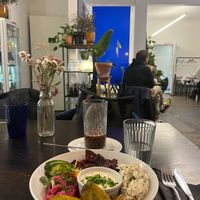 Eggplant “herring”, hot chocolate, and a bit of the interior. at Mazā Terapija in Riga