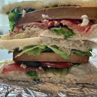Tofu sandwich with lettuce, pickles, tomatoes and sauce    at Mazā Terapija in Riga