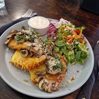 Mushroom potato pancakes at Mazā Terapija in Riga