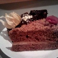 Slice of 'honey' cake at Mazā Terapija in Riga