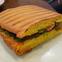 Sandwich with vegan sausage at Mazā Terapija in Riga