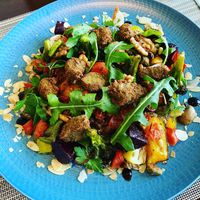 Warm roasted veg Salad topped with crispy falafels 🌱  at Azur - Four Seasons Hotel in Tunis