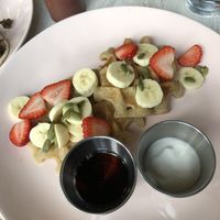 Weekend waffles with syrup and coconut creme  at Tribal All Day Cafe in Dallas