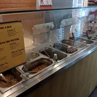 Counter with vegan labels at Oak's Burritos in Rio De Janeiro
