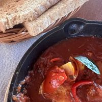 Shakshuka. They replaced egg with tofu. Toast bread potentially may contain milk as well.  at Luca Loko in San Juan Siquijor