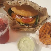 Raspberry soda, Vienna burger, sweet fries and basil-lemon dip at Swing Kitchen - Währinger Straße in Vienna