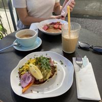 Huevos rancheros and granola with fruit and coconut yogurt  at Jaskolka in Warsaw