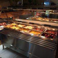 Hot dishes.  Kofta balls, dhal, coconut curry, some pasta and a delicious pudding when we visited. at Govindas - Surfers Paradise in Surfers Paradise