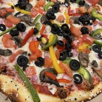 Vegan cheese on veggie pizza  at Blue Moon Pizza in Fort Myers
