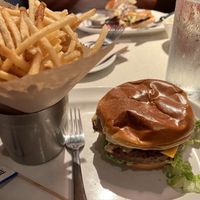 French fries and impossible burger with vegan cheese at The Counter in Naples