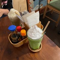 Iced matcha latte with vegan whipped cream at Ippuku Tea House in York