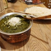 Palak tofu with plain basmati rice at Bhajan Cafe in Krakow