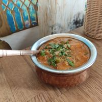 (Vegan) tofu with peas and tomato sauce at Bhajan Cafe in Krakow