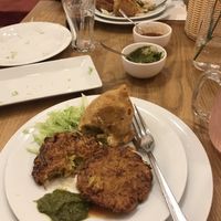 Onion bahji and veggie samosa  at Bhajan Cafe in Krakow