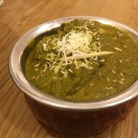 Palak tofu in spinach sauce. at Bhajan Cafe in Krakow