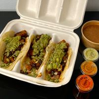 deluxe sweet potato black bean tacos - crema + smoky beans (takeout) at Rocket Taco in Seattle
