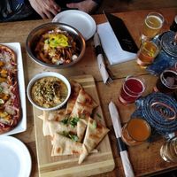 Vegan pizza, poutine and hummus with two beer flights ! at La Souche in Quebec