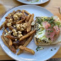 Bah mi sandwich with Tofu and side of vegan poutine at La Souche in Quebec