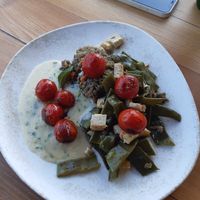Oat cream with housegrown herbs, lentils and seasonal green beans. Plus tofu and caramelised seasonal tomato. at Gostilna Mencinger in Gornja Radgona
