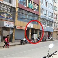 outside (on a Saturday morning, lots of closed shops) at Om's Veg Momo in Kathmandu