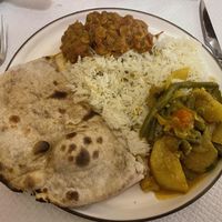 My plate with vegetable curry, bharta, rice, and chapati  at Goa Restaurant in Clermont-ferrand