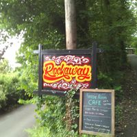 This is the sign you can see from the street. at Rockaway Cafe in Temple Cloud