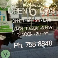 Always love the vegan symbol on a restaurant door!  at Kathakali in New Plymouth