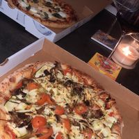 Zucchini pizza added cherry tomatoes and mushroom, swap cheese for vegan cheese  at El Capitano in Noosa Heads