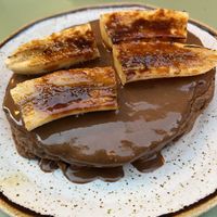 Panqueca vegan com "nutella" e banana caramelizada   at Nicolau Lisboa in Lisbon