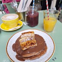 The vegan Pancakes with Chocolatecream and caramelized Banana 💚 at Nicolau Lisboa in Lisbon
