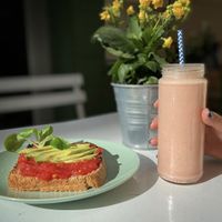 Tomato avocado toast and banana strawberry yoghurt smoothie  at NicPic in Malaga