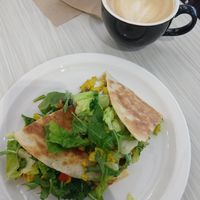 Breakfast Piadini & vegan maple latte at Brightside Kitchen in Des Moines