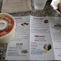 Taking home hummus at Falafel Palace in Northridge