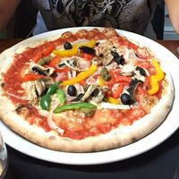 Vegetariana pizza with mushrooms, red, green and yellow peppers, olives, capers onion and vegan cheese at La Dolce Vita in Dumfries