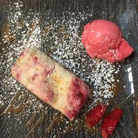 Raspberry meringue parfait with blood orange sorbet and fresh strawberries at La Dolce Vita in Dumfries