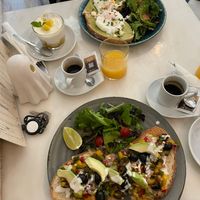 Vegan toast with avocado, olives and other vegetables at Frutaria in Lisbon