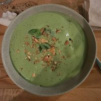 Pêche, gâteau amande et espuma basilic at Les Mauvaises Herbes in Lyon