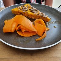 Cheesecake carotte-cumin at Les Mauvaises Herbes in Lyon