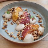 Nectarine rôtie, crème infusée à la verveine, granola at Les Mauvaises Herbes in Lyon