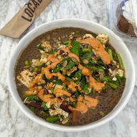 Power Bowl (Black Lentils, San San Tofu, Cauliflower Rice, Peas, Sauteed Greens, Pumpkin Seeds, Romesco Sauce)  at Local Foods - Upper Kirby in Houston