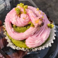 Spinach cupcake with rose water & pistachio topping  at The Thyme Pizzeria in Winnetka