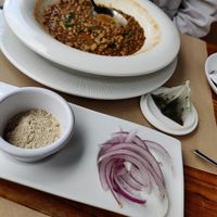 Lentil soup with sides. Ask to have it without cheese - otherwise you will get three sides, one of them being goat cheese. The sides shown here are some Canarian flower and onions at Puerta Verde in Lanzarote