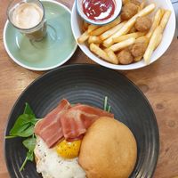 Popcorn chikn + chips $10.00; Bacon and egg roll $20.00 (the white fried egg part was soo similar to the real thing, the yolk was bland, needs black salt) at One for the Crow in Maidstone