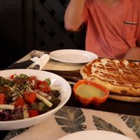Vegan pizza and summer salad at Cafe Tropical in Koh Lipe