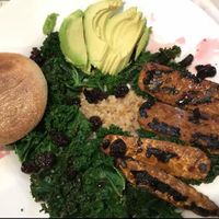 Vegan tempeh buddha bowl with brown rice, kale, avacado, dried fruit and an English muffin at Anna's House - E Beltline in Grand Rapids