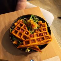 Sweet potato with salad, pomegranate, guacamole. at Riz Riz - Marais in Paris