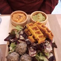 Appetizer "Discovery to share"... salad, sweet potato pancakes, guacamole and little b balls of rice delicious!  at Riz Riz - Marais in Paris